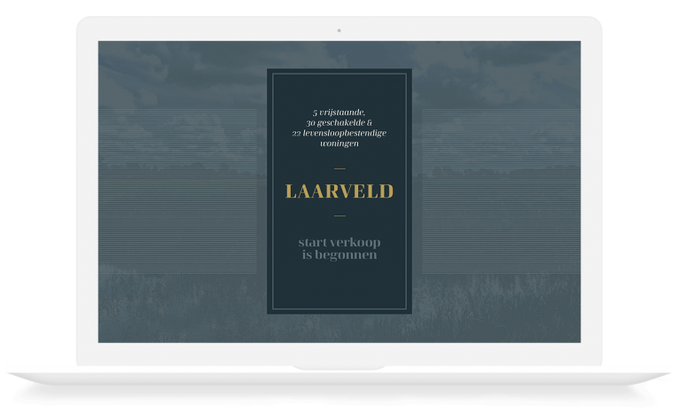 Een macbook met de website van Laarveld